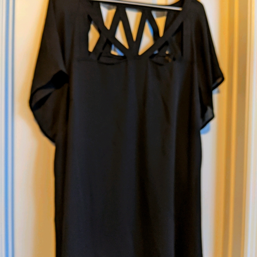 Torrid size 3 Black top with cut outs.